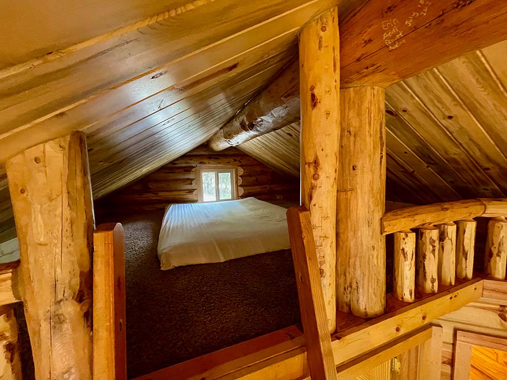creek cabin loft bed area